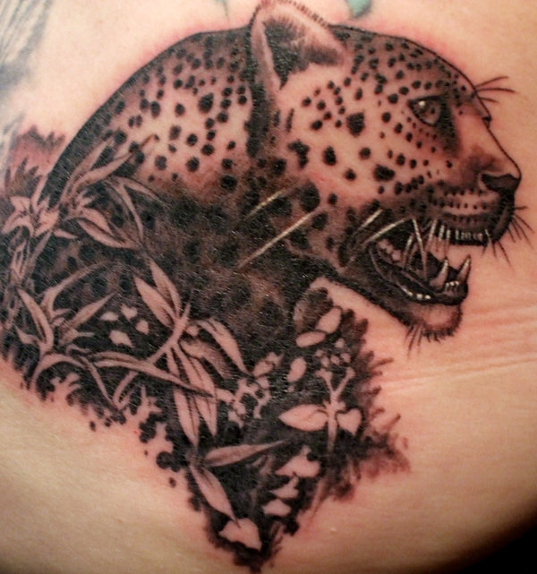 Tatuagens-masculinas-felino-costas